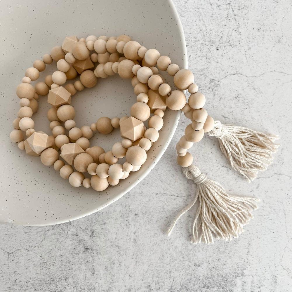 Geometric wood bead garland with tassels - Deco Azul