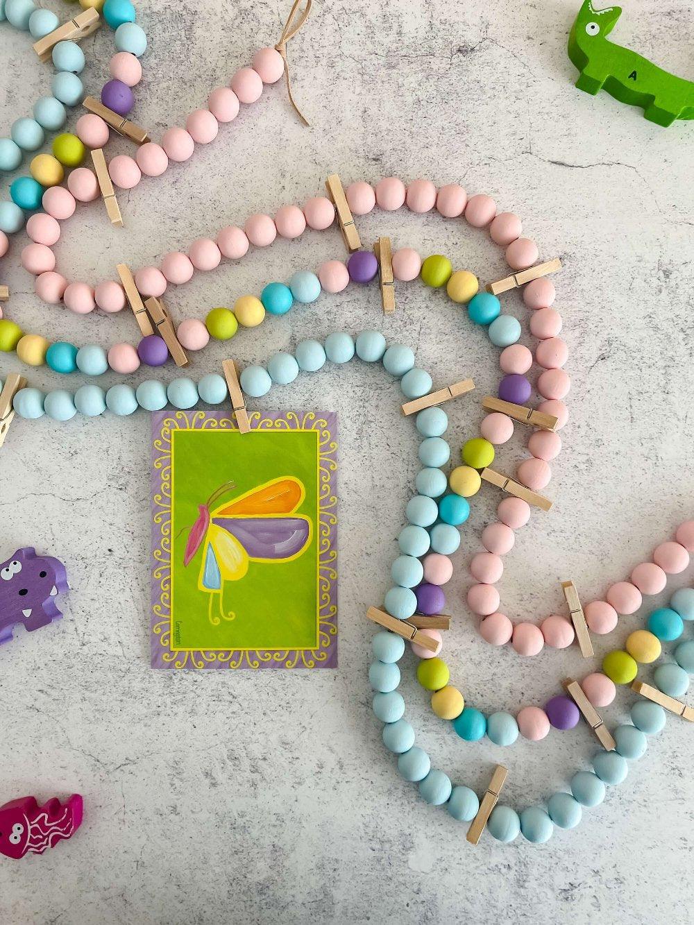 Photo display with 12 clothespins - Deco Azul