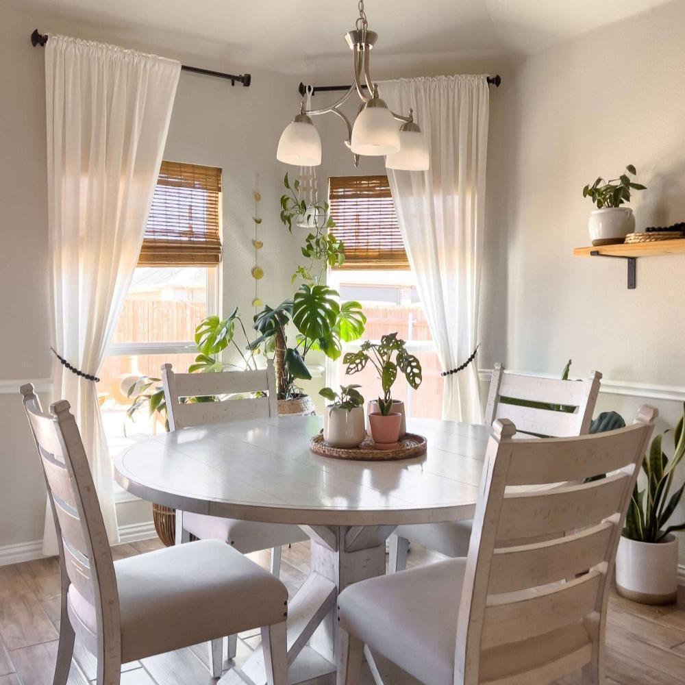 black curtain hooks in a dining room