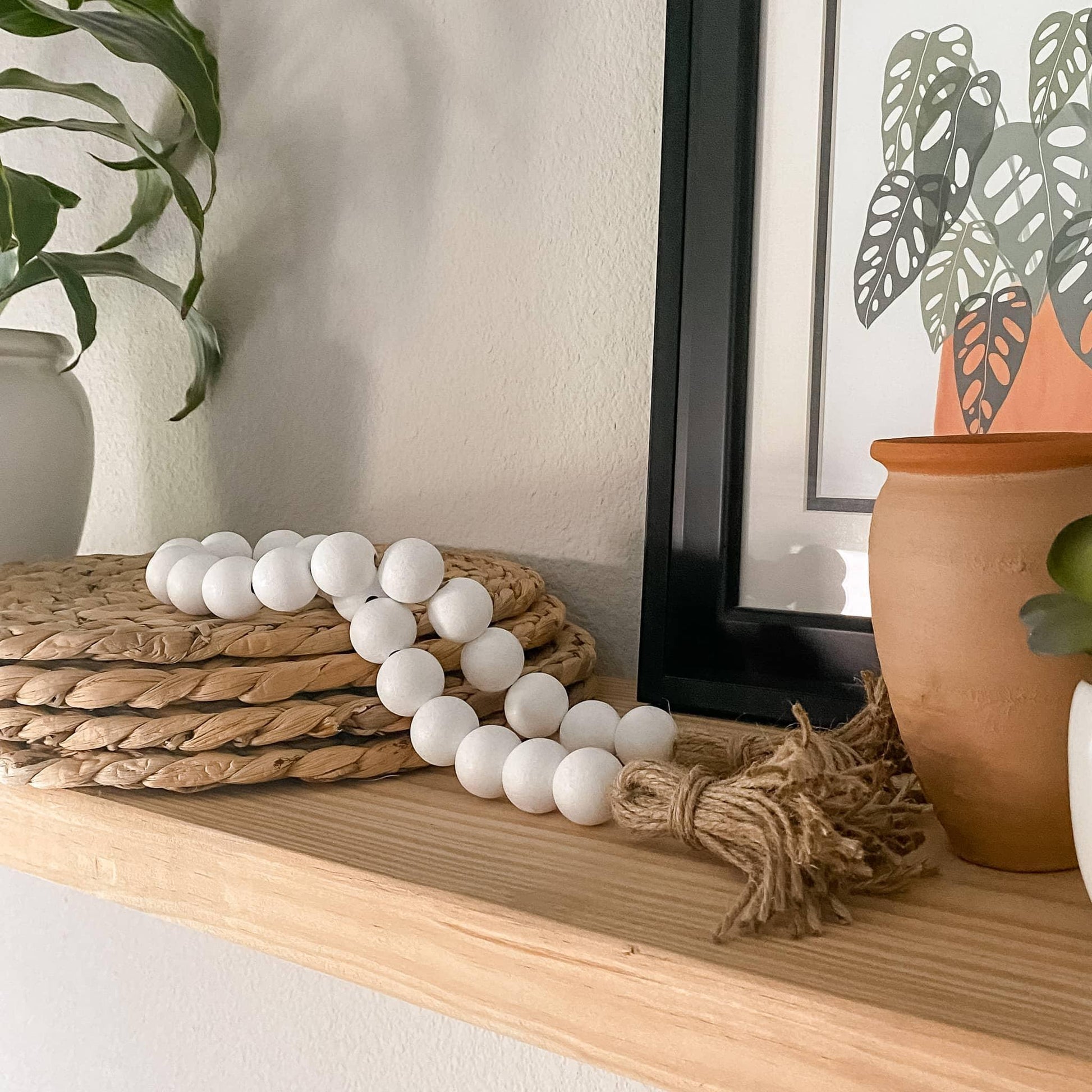 white wood bead garland with tassels 