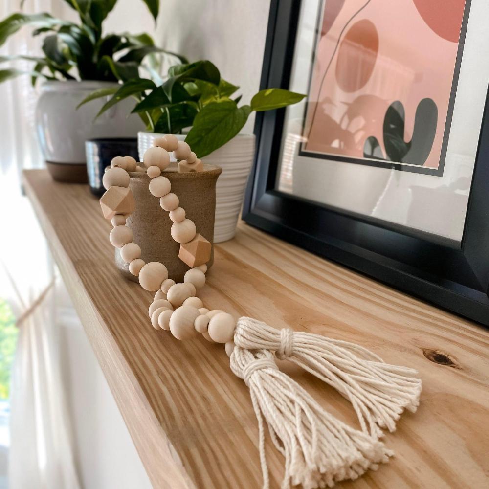 Geometric wood bead garland with tassels - Deco Azul